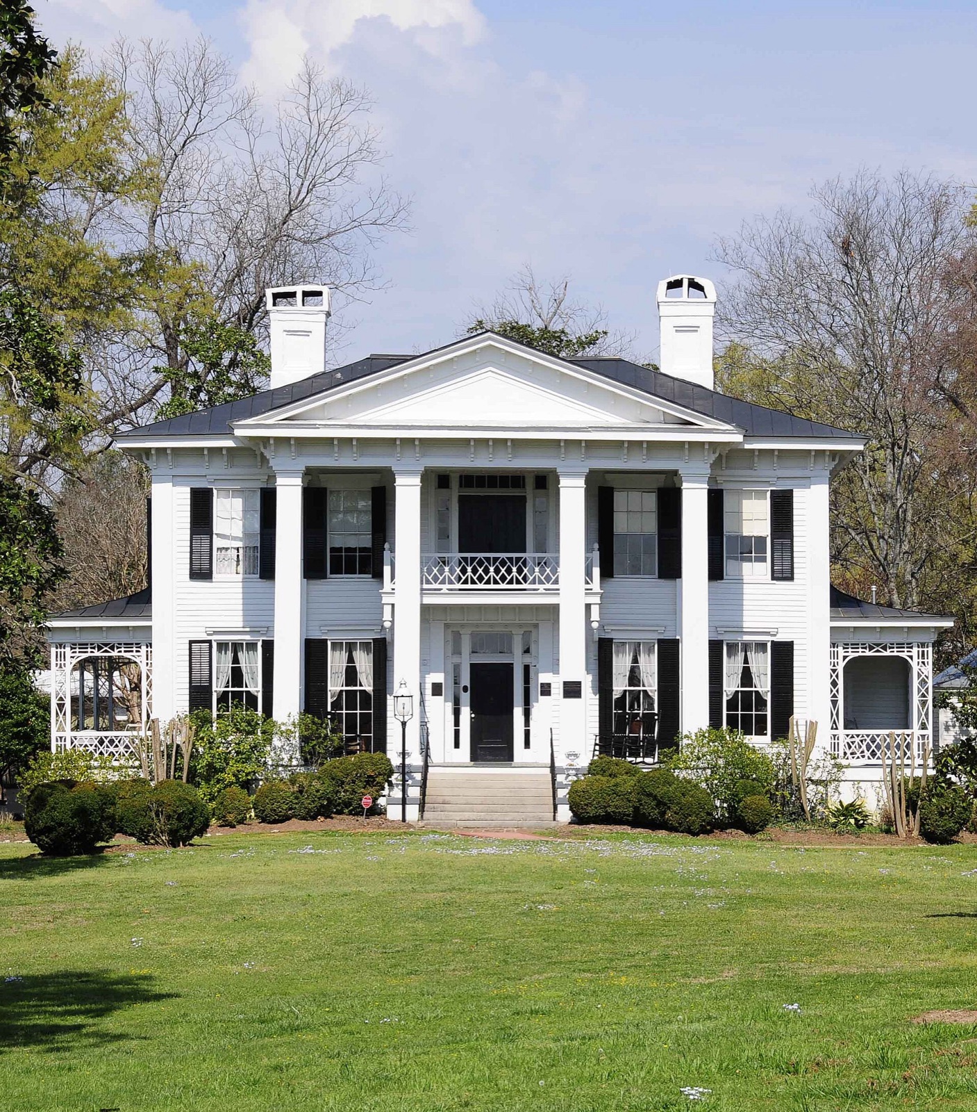 The historic square in Abbeville, South Carolina, with its opera house and old brick storefronts around a green.
