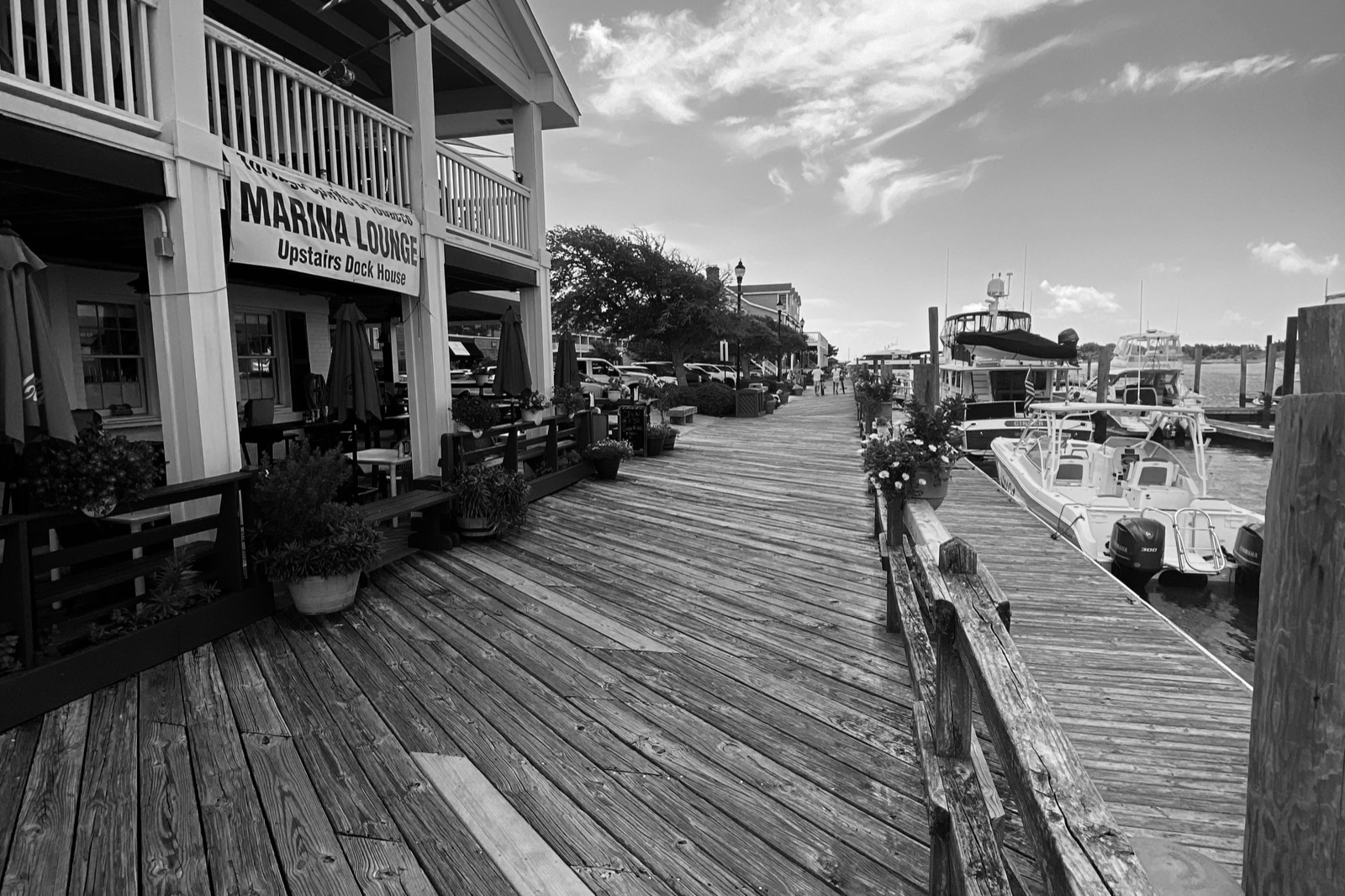 A wooden waterfront walkway along the harbor in Beaufort, North Carolina