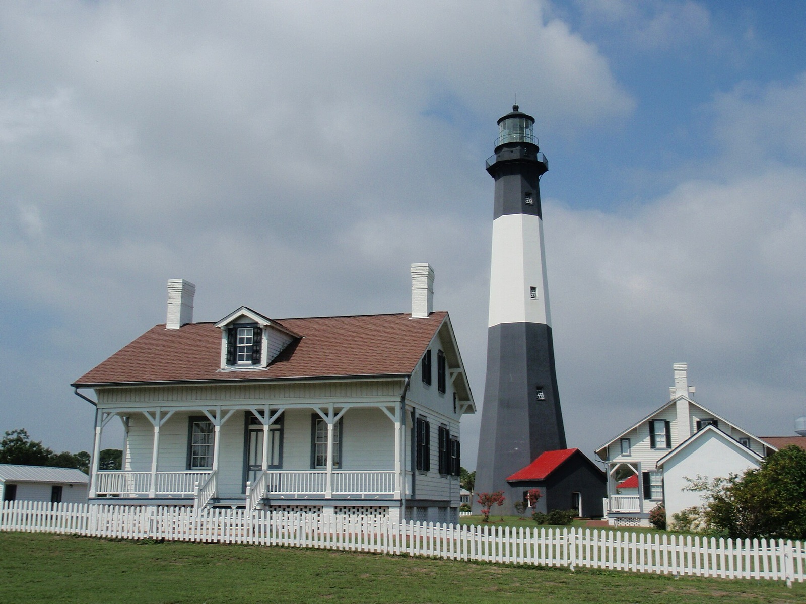 The Tybee Island Lighthouse near Savannah, Georgia, banded black at top and bottom with white through the middle.