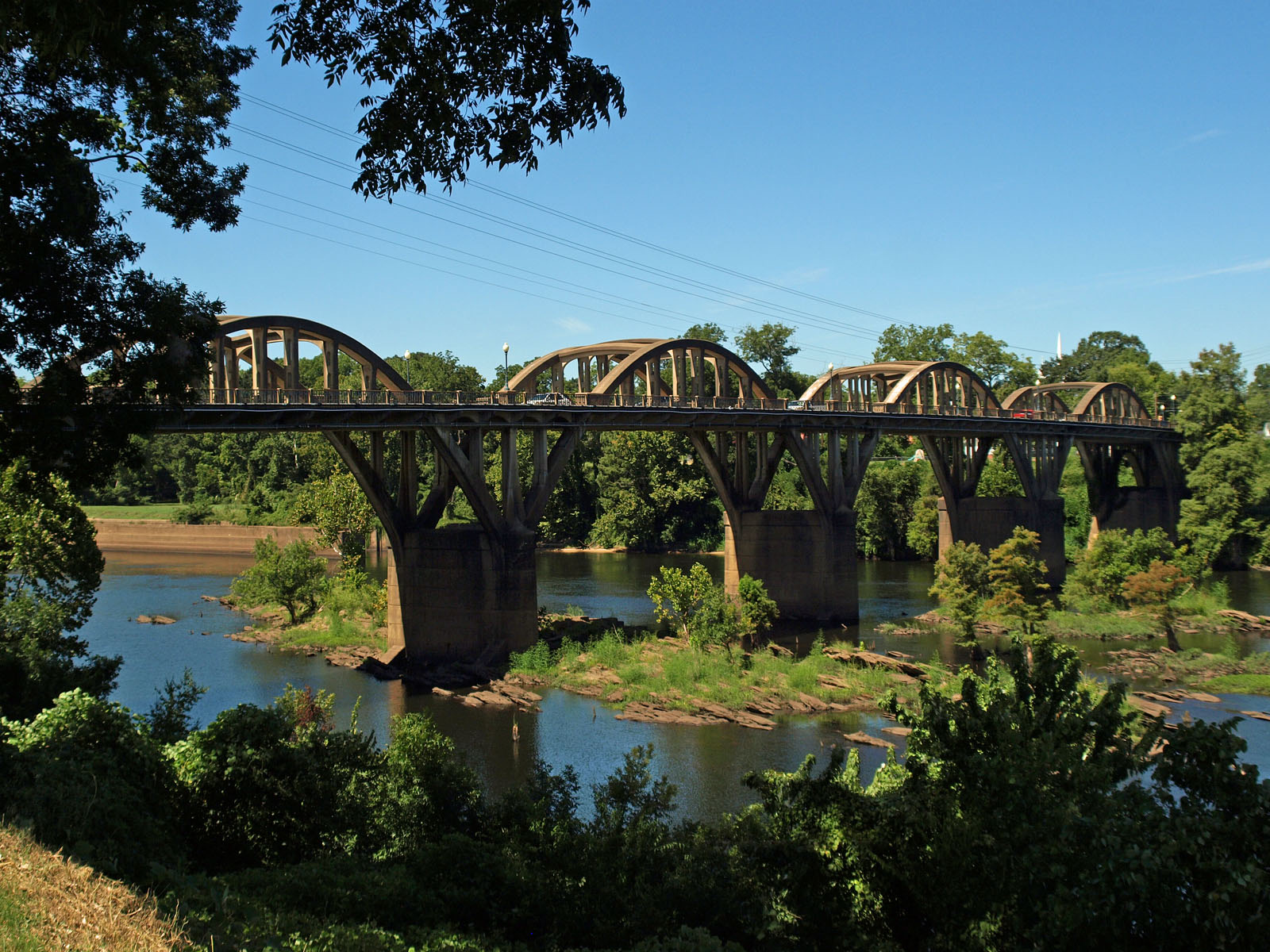 The Bibb Graves Bridge arching over the Coosa River in downtown Wetumpka, Alabama
